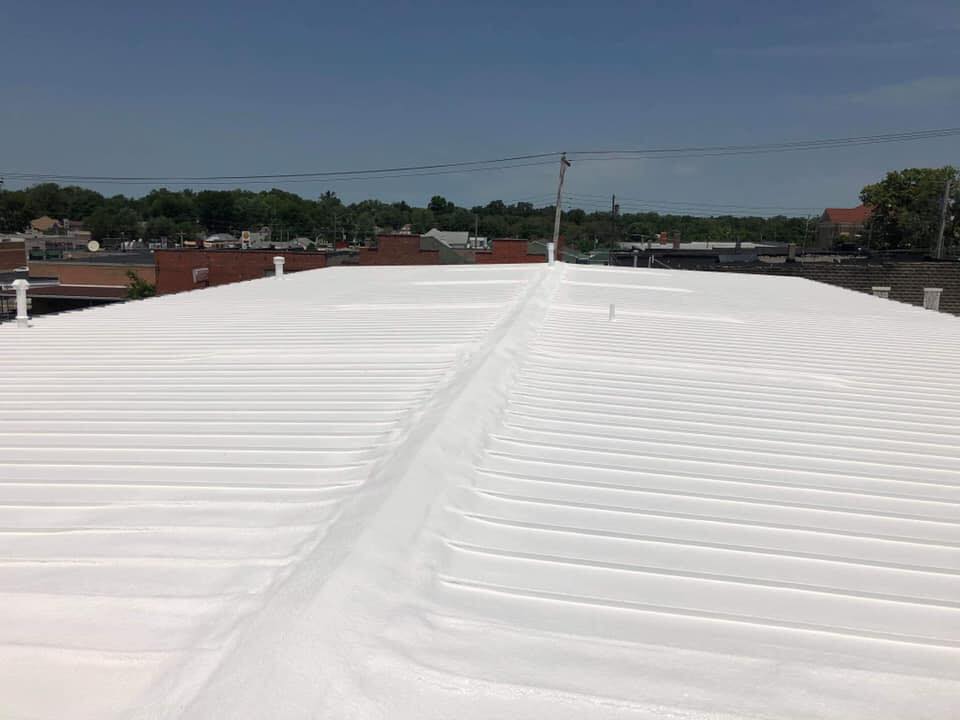 A completed white roof restoration project.